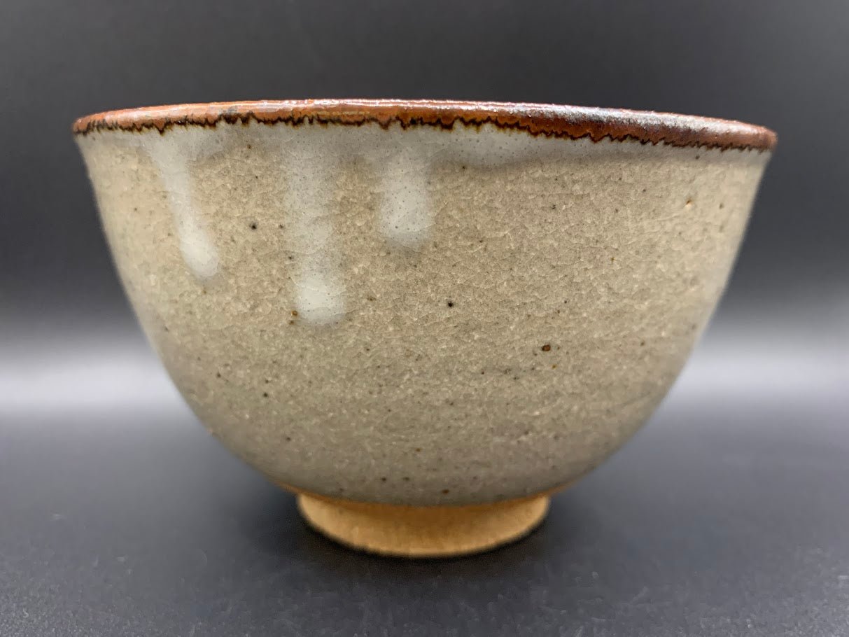 Japanese celadon pottery, handmade celadon tea bowl, ribbed ceramic tea bowl, carved leaf motif pottery, traditional Japanese ceramics, Longquan-style celadon ware, matcha chawan bowl, artisanal tea ceremony bowl, crackle glaze pottery, Song dynasty style ceramics, Japanese green glaze bowl, hand-thrown Japanese pottery, tea culture ceramics, Japanese chawan design, antique-style Japanese bowl, leaf pattern pottery, ribbed matcha bowl, celadon carving techniques, Japanese celadon glaze art, traditional Japa