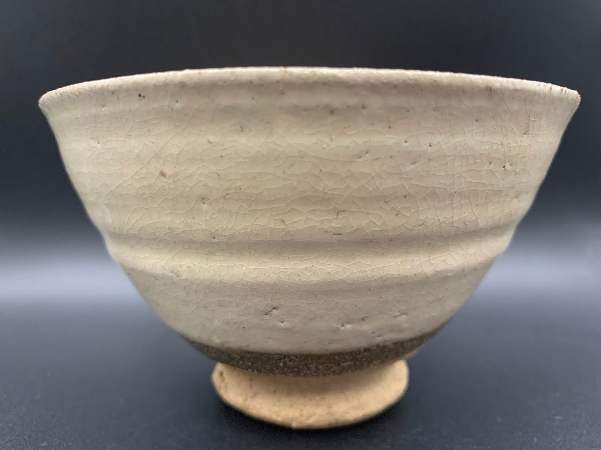 Japanese celadon pottery, handmade celadon tea bowl, ribbed ceramic tea bowl, carved leaf motif pottery, traditional Japanese ceramics, Longquan-style celadon ware, matcha chawan bowl, artisanal tea ceremony bowl, crackle glaze pottery, Song dynasty style ceramics, Japanese green glaze bowl, hand-thrown Japanese pottery, tea culture ceramics, Japanese chawan design, antique-style Japanese bowl, leaf pattern pottery, ribbed matcha bowl, celadon carving techniques, Japanese celadon glaze art, traditional Japa