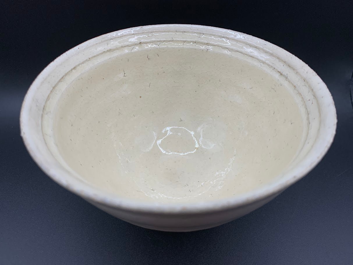 Japanese celadon pottery, handmade celadon tea bowl, ribbed ceramic tea bowl, carved leaf motif pottery, traditional Japanese ceramics, Longquan-style celadon ware, matcha chawan bowl, artisanal tea ceremony bowl, crackle glaze pottery, Song dynasty style ceramics, Japanese green glaze bowl, hand-thrown Japanese pottery, tea culture ceramics, Japanese chawan design, antique-style Japanese bowl, leaf pattern pottery, ribbed matcha bowl, celadon carving techniques, Japanese celadon glaze art, traditional Japa