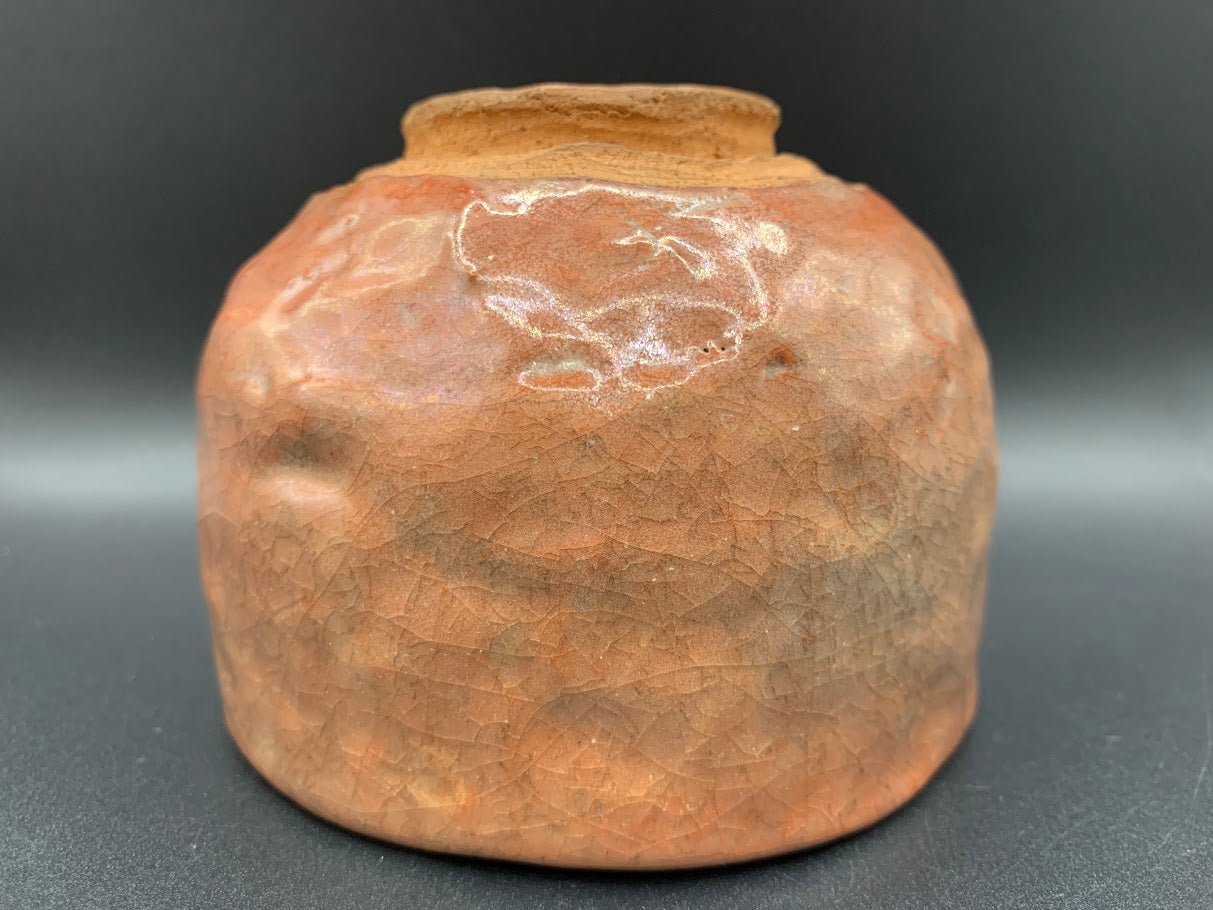 Japanese celadon pottery, handmade celadon tea bowl, ribbed ceramic tea bowl, carved leaf motif pottery, traditional Japanese ceramics, Longquan-style celadon ware, matcha chawan bowl, artisanal tea ceremony bowl, crackle glaze pottery, Song dynasty style ceramics, Japanese green glaze bowl, hand-thrown Japanese pottery, tea culture ceramics, Japanese chawan design, antique-style Japanese bowl, leaf pattern pottery, ribbed matcha bowl, celadon carving techniques, Japanese celadon glaze art, traditional Japa