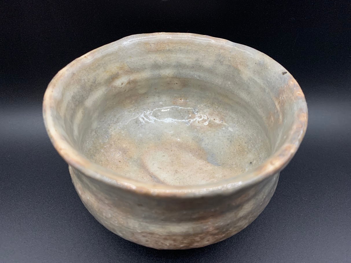 Japanese celadon pottery, handmade celadon tea bowl, ribbed ceramic tea bowl, carved leaf motif pottery, traditional Japanese ceramics, Longquan-style celadon ware, matcha chawan bowl, artisanal tea ceremony bowl, crackle glaze pottery, Song dynasty style ceramics, Japanese green glaze bowl, hand-thrown Japanese pottery, tea culture ceramics, Japanese chawan design, antique-style Japanese bowl, leaf pattern pottery, ribbed matcha bowl, celadon carving techniques, Japanese celadon glaze art, traditional Japa