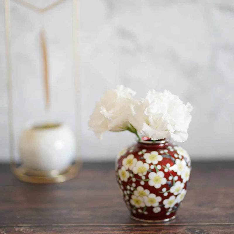 Owari cloisonne vase, Japanese cloisonne plum blossom, red cloisonne enamel vase, Kato Shippo vase, Japanese enamel art, plum blossom decorative vase, wired cloisonne Meiji style, handcrafted Japanese cloisonne, small Japanese collectible vase, Aichi cloisonne craft, traditional Japanese plum design, spherical cloisonne vase, luxury Japanese home decor, enamel art vase Japan, wired enamel plum vase.