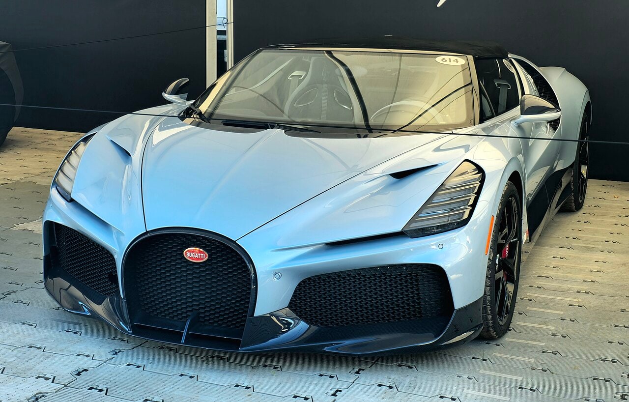 A silver-blue Bugatti W16 Mistral viewed from the front three-quarter angle