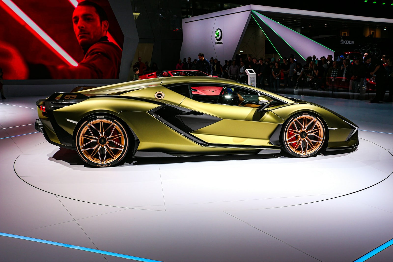 A gold Lamborghini Sián FKP 37 shown in full side profile