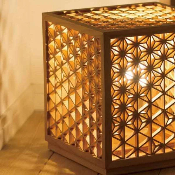 Kumiko lantern, Japanese wooden lantern, Asanoha hemp leaf lamp, Kumiko joinery light, Akita cedar lantern, Japanese cube lamp, handcrafted Japanese lamp, Hyakunen Monogatari project lantern, Ominato Bunkichi Shoten lighting, traditional Japanese Kumiko lamp, Mitsukude Kumiko lantern, Japanese wood and light design, artisan Kumiko lighting, Niigata handmade lamp, Japanese lattice lamp, housewarming Japanese lantern, symbolic hemp leaf lamp
