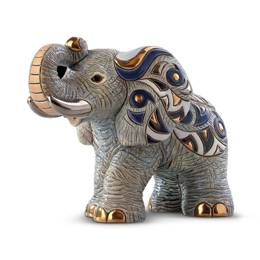 Handcrafted African elephant ceramic figurine with gold, blue, and white patterns, raised trunk for good luck. Symbol of wisdom, strength, and good fortune. Ceramic Symbol of Strength & Luck.