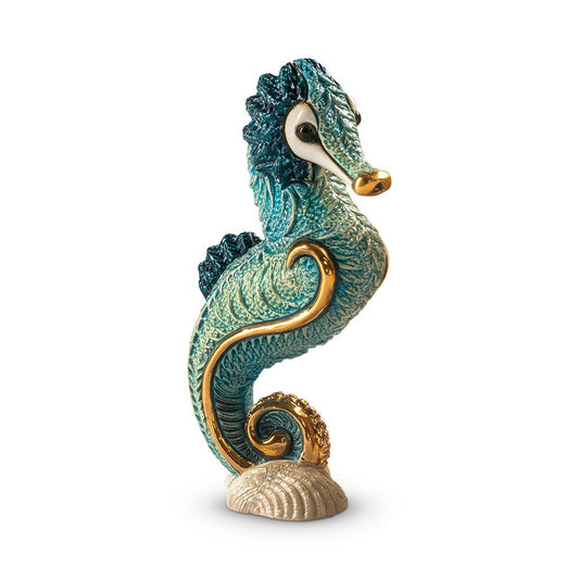 Handcrafted ceramic seahorse figurine with platinum and gold accents, 8×5×14 cm handmade in Uruguay, vibrant enamel glaze details; unique artisanal marine sculpture for coastal décor, gift boxed with authenticity certificate, ideal for collectors and nautical interiors.