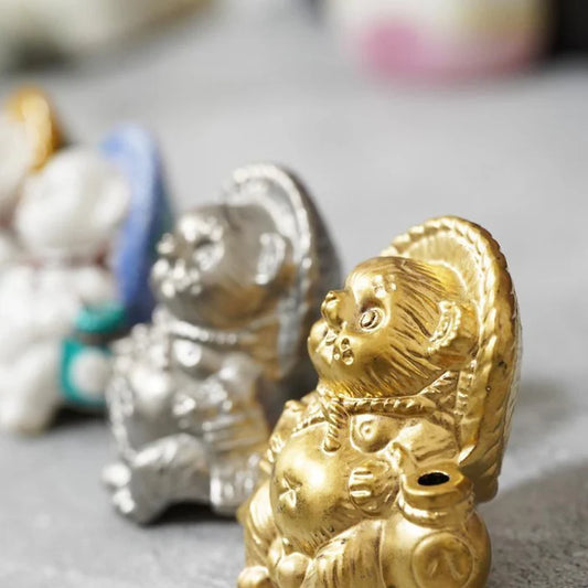 Shigaraki ware tanuki, Japanese raccoon dog figurine, gold silver tanuki set, Yamasho Touki pottery, Japanese good luck charm, handmade tanuki ornament, Japanese folklore figurine, entrance good fortune talisman, traditional Shigaraki pottery, collectible Japanese tanuki, gold tanuki figurine Japan, silver tanuki figurine Japan, Shiga Prefecture pottery, lucky raccoon dog Japan, Japanese prosperity charm, handmade Japanese ceramic, tanuki statue for home, Japanese pottery gift set.