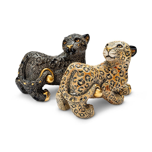 Black Panther ceramic figurine. Handcrafted panther sculpture. Panther statue. Symbolic animal figurine. Panther decor collectible. Uruguayan ceramic art. Black and gold panther statue. Handmade wildlife sculpture. Elegant animal totem figurine. Artisan ceramic panther. Gold-accented panther ornament. Black jungle cat figurine. Collectible predator statue.