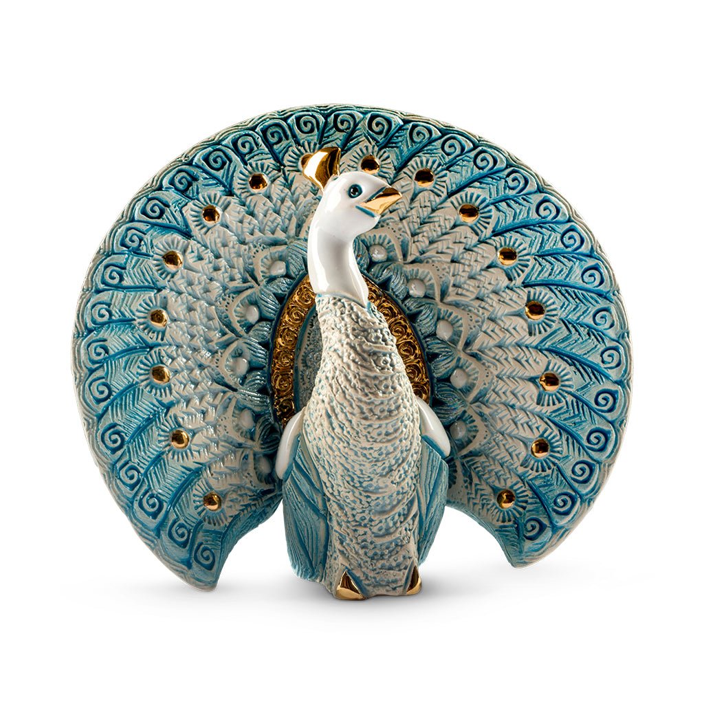 Hand‑carved enamel peacock figurine with gold and platinum accents. Compact symbol of beauty, renewal. Gift‑boxed with authenticity.