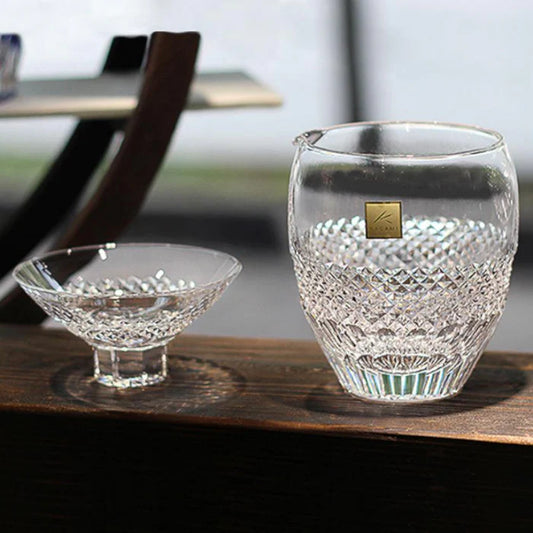 Edo Kiriko glass set, Japanese cut glass pitcher and cups, Kagami Crystal fish scale design, uroko pattern crystal glass, handcrafted Japanese crystalware, traditional Japanese cut glass, Edo Kiriko pitcher and bowl set, crystal serving set Japan, Ibaraki Kagami Crystal, Japanese gift crystal set, prosperity fish scale motif glassware, handmade Japanese glass pitcher, collectible Japanese crystal art