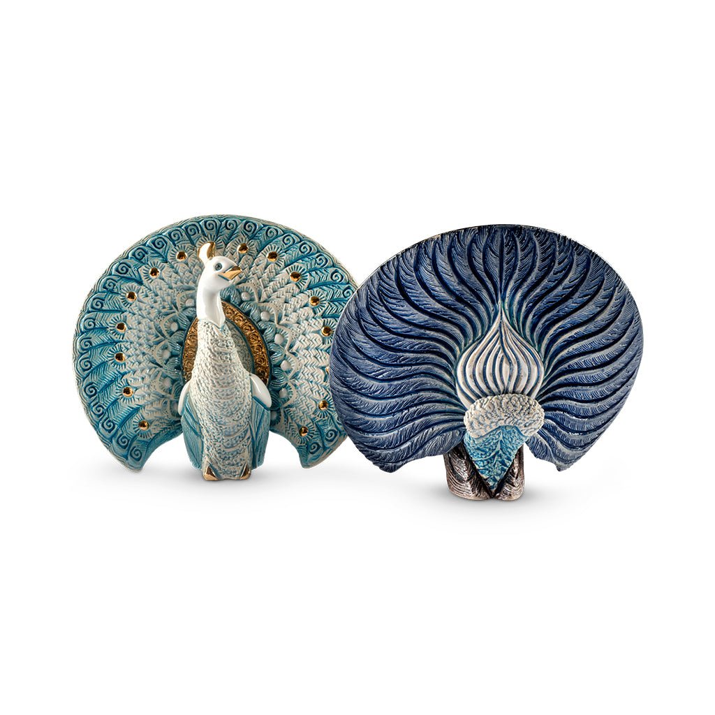 Hand‑carved enamel peacock figurine with gold and platinum accents. Compact symbol of beauty, renewal. Gift‑boxed with authenticity.