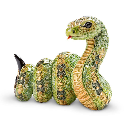 Artisan Ceramic Snake Sculpture. Hand‑Painted Coiled Snake Figurine. Gold‑Accent Ceramic Snake Decor. Enamel Glazed Snake Statue. Uruguayan Craft Ceramic Serpent. Hand‑Carved Snake Home Accent. Snake Transformation Symbol Figurine. Tabletop Ceramic Animal Sculpture