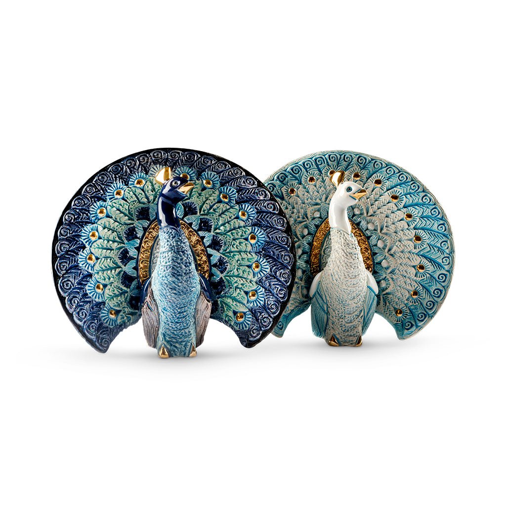 Hand‑carved enamel peacock figurine with gold and platinum accents. Compact symbol of beauty, renewal. Gift‑boxed with authenticity.