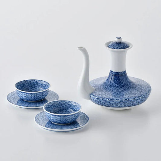 Seigaiha teapot set, Japanese porcelain tea set, Mikawachi ware tea set, Hirado Shozan porcelain, Japanese wave pattern cups, blue and white porcelain Japan, traditional Japanese tea set, Seigaiha motif pottery, Nagasaki porcelain ware, hand-painted Japanese ceramics, Hirado teapot and cup set, ocean wave design porcelain, Japanese gift tea set, artisanal porcelain Japan