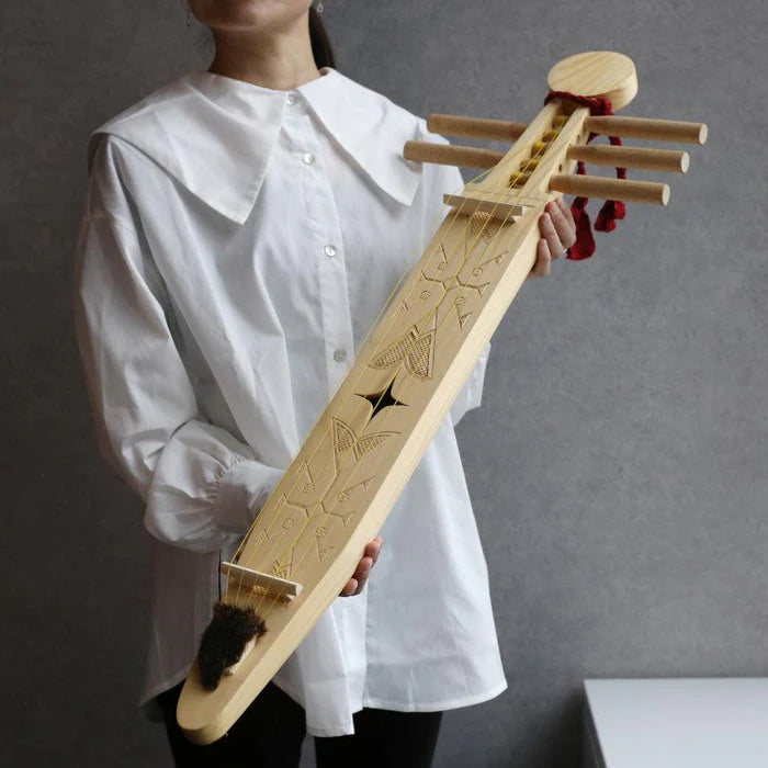 Ainu Tonkori, traditional Ainu instrument, Japanese Indigenous string instrument, Karafuto Ainu Tonkori, Sakhalin fir wood Tonkori, Ainu crafts Hokkaido, handmade Tonkori, Indigenous Japanese music instrument, Tonkori five-string koto, Hayasaka Masaga Tonkori, Ainu carving traditions, cultural instrument Japan, Tonkori music heritage, rare Japanese instrument