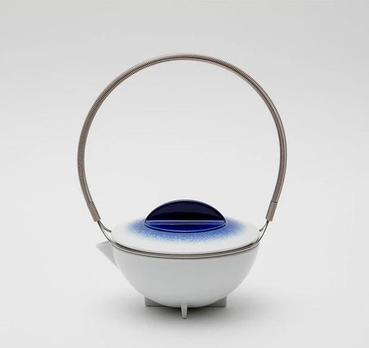 Japanese porcelain teapot, Imari Arita ware teapot, Studio Wieki Somers teapot, modern Japanese teapot, porcelain teapot with handle, designer Japanese teapot, cobalt blue teapot, lapis lazuli porcelain teapot, Japanese tea ceremony teapot, Imari porcelain tea set, Saga Prefecture porcelain, Japanese pottery collaboration, contemporary Japanese teaware, handmade porcelain teapot, luxury Japanese teapot.