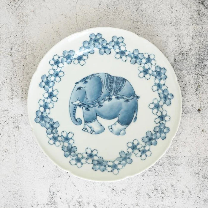 Mikawachi ware porcelain plate, Hirado Shouzan porcelain, Japanese cherry blossom plate, elephant design porcelain, blue and white Japanese plate, Japanese ocean wave pattern dish, Mikawachi large plate set, traditional Japanese porcelain, Japanese symbolic dinnerware, handmade Japanese porcelain gift, Nagasaki porcelain plates, sakura and elephant plate set, Japanese auspicious porcelain, collectible Japanese dish set
