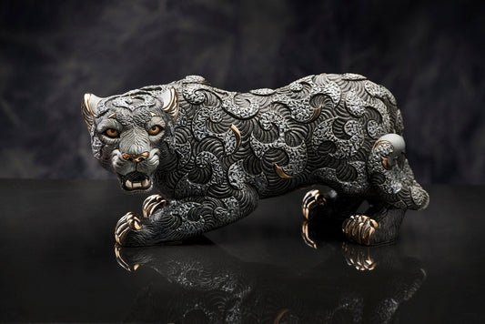 Ceramic panther; fine animal figurine and decorative sculpture. Hand-painted detailing, gold and platinum accents, and limited edition. High-end animal sculpture, symbolic art piece, and heritage ceramic. Ideal for luxury interiors, classic decor themes, or cultural collections, it also appeals to those interested in animals with mythic or spiritual significance