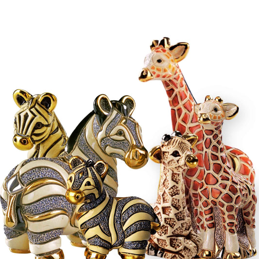 Hand-painted giraffe figurines. Zebra and giraffe sculpture set. Ceramic African animal figurines. Safari animal collectible statues. Baby giraffe and zebra decor. Artisan wildlife figurine bundle. Gold-accented ceramic zebra. Handmade African animal ornaments. Enamel giraffe and zebra collectibles. Miniature safari animal statues