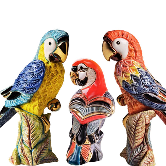 Hand-painted parrot figurines. Colorful tropical bird statues. Macaw ceramic sculpture. Artisan bird collectibles. Red and blue parrot home decor. Handmade exotic parrot ornament. Enamel parrot statue set. Decorative bird figurines gift set. Ceramic parrot collection Uruguay. Platinum accent parrot sculpture