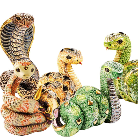 Handcrafted snake figurines. Cobra ceramic statue. De Rosa snake collection. Symbolic snake decor. Reptile animal figurines. Artisan serpent sculpture. Green snake ceramic art. Snake gift set. Handmade cobra collectible. Mythical animal figurines. Luxury home snake décor