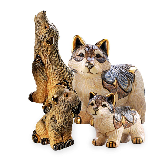 Handmade wolf figurine set. Ceramic wolf collectible sculptures. Wolf and cub ceramic art. Symbolic wolf decor bundle. Artisan ceramic mountain wolves. Howling wolf figurine with enamel detail. Hand-painted wolf sculptures. Gift set for wolf lovers. Gold accented animal figurines. Uruguayan ceramic wildlife collection