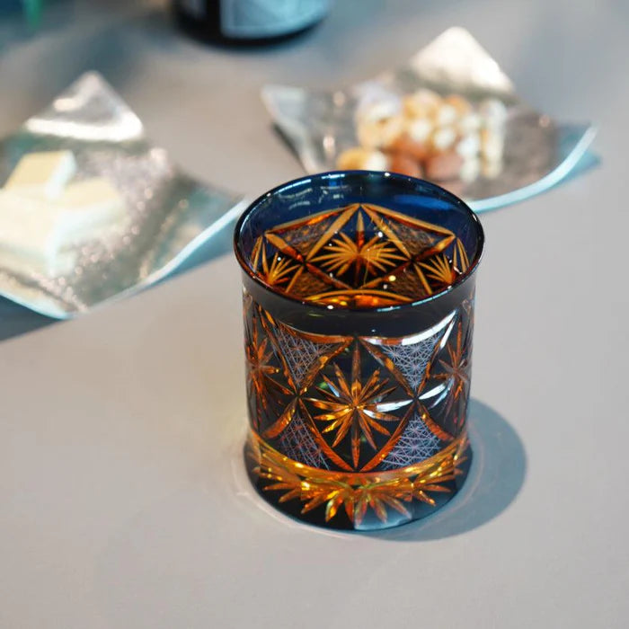 Japanese Kiriko rocks glass, Ginwan no Hana glass, Edo Kiriko drinking glass, traditional Japanese cut glass, purple Kiriko glass, blue and orange Kiriko glass, hand-cut Japanese glassware, chrysanthemum motif glass Japan, Tokyo artisan glass, Japanese starburst glass design, collectible Kiriko tumbler, handmade soda glass Japan, luxury Japanese cut glass, Japanese cultural gift glass, Edo Kiriko chrysanthemum cut glass