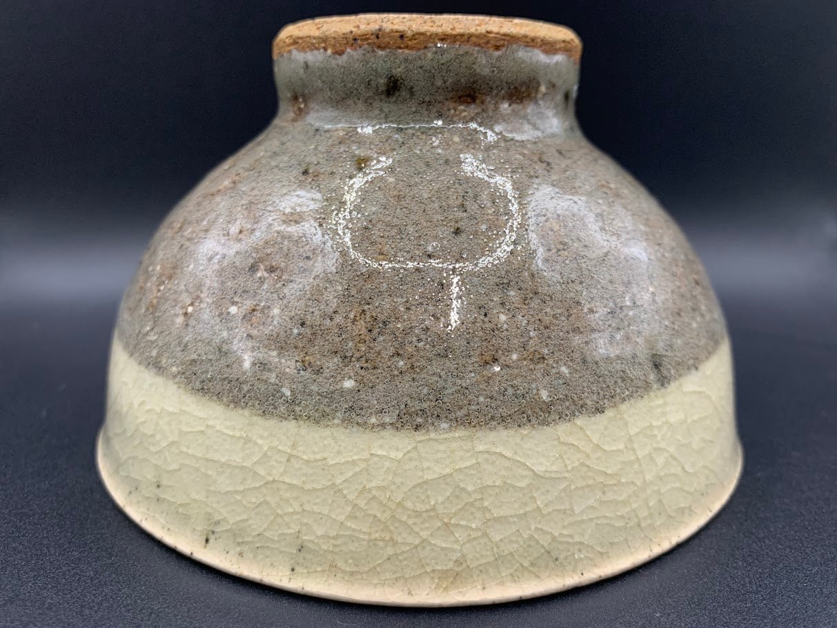 Japanese celadon pottery, handmade celadon tea bowl, ribbed ceramic tea bowl, carved leaf motif pottery, traditional Japanese ceramics, Longquan-style celadon ware, matcha chawan bowl, artisanal tea ceremony bowl, crackle glaze pottery, Song dynasty style ceramics, Japanese green glaze bowl, hand-thrown Japanese pottery, tea culture ceramics, Japanese chawan design, antique-style Japanese bowl, leaf pattern pottery, ribbed matcha bowl, celadon carving techniques, Japanese celadon glaze art, traditional Japa