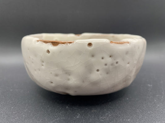 Japanese celadon pottery, handmade celadon tea bowl, ribbed ceramic tea bowl, carved leaf motif pottery, traditional Japanese ceramics, Longquan-style celadon ware, matcha chawan bowl, artisanal tea ceremony bowl, crackle glaze pottery, Song dynasty style ceramics, Japanese green glaze bowl, hand-thrown Japanese pottery, tea culture ceramics, Japanese chawan design, antique-style Japanese bowl, leaf pattern pottery, ribbed matcha bowl, celadon carving techniques, Japanese celadon glaze art, traditional Japa