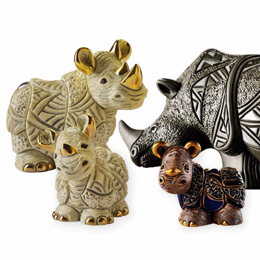 Rhino figurine gift set. Handcrafted rhino statues. Ceramic and gres rhino sculptures. White rhino decorative figure. Black gres rhinoceros statue. De Rosa rhino collection. Miniature rhino figurine collectible. Enamel rhino figurines. Symbolic wildlife sculptures. Animal totem ceramic art
