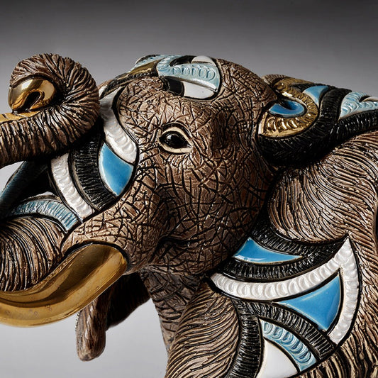 This collectible elephant sculpture suits lovers of wildlife art, fine ceramics, and limited-edition home accents. It appeals to collectors of animal figurines, art gallery pieces, and handcrafted décor. Ceramic elephant statue, limited edition wildlife sculpture, handmade animal art.