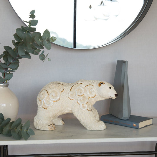 This limited edition ceramic polar bear sculpture belongs to the collectible animal figurine niche. It appeals to collectors of wildlife art, hand-painted ceramics, and symbolic animal statues. As a handcrafted art piece, it fits within the realms of fine home décor, cultural giftware, and artisan-made collectibles.